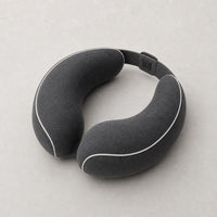 Almohada Cervical Eléctrica Destensa sobre fondo neutro